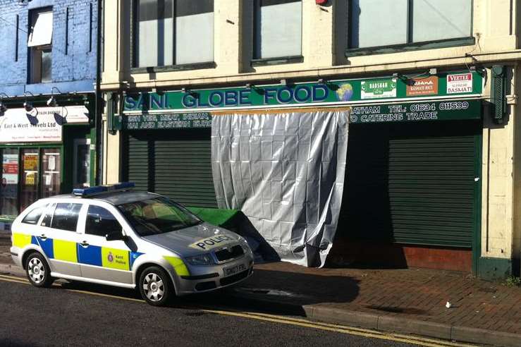 Police at Sani Globe Food store in Chatham after Mrs Chaggar's body was found