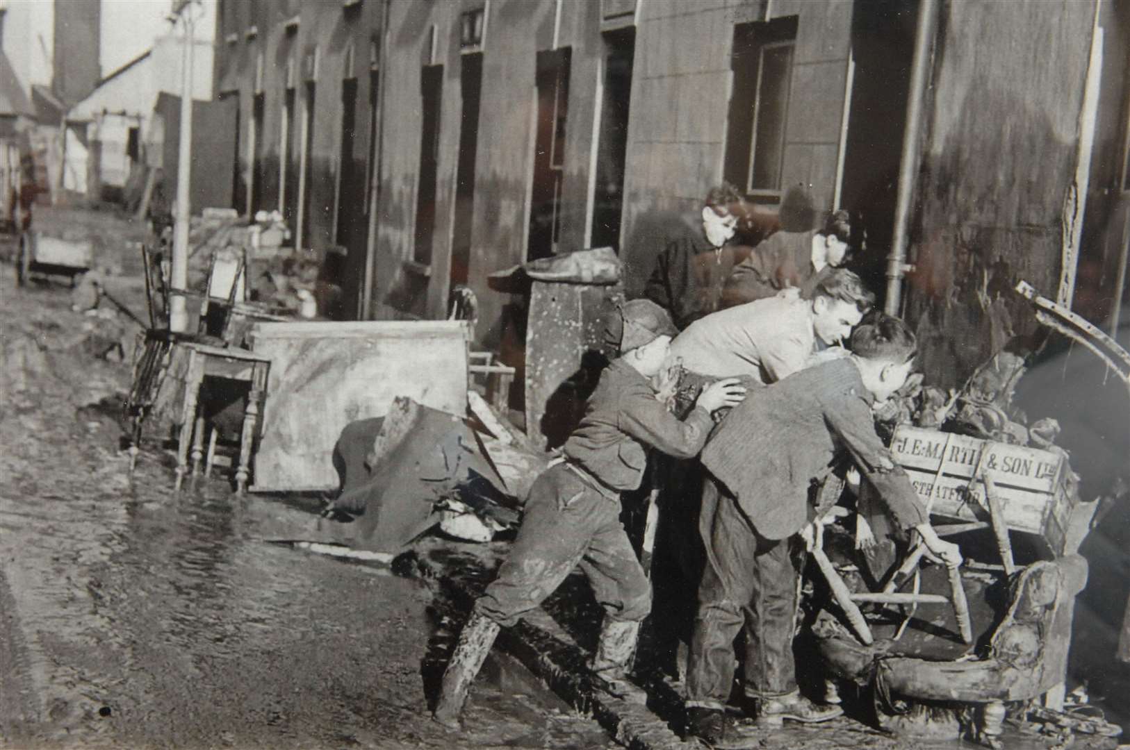 Children rescuing belongings from Beach Street, Herne Bay