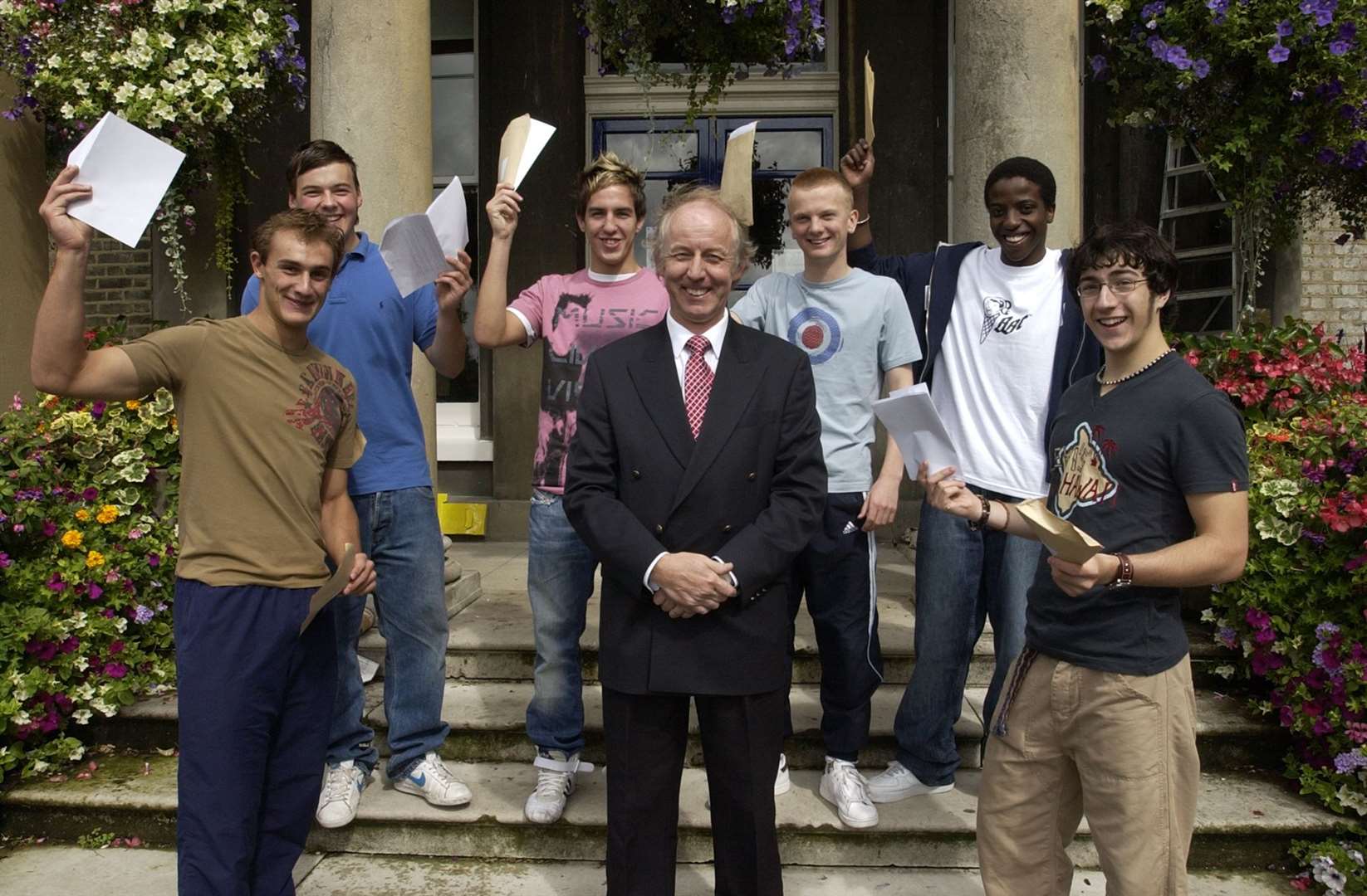 Proud headmaster Paul Henderson with pupils at Eltham College, Bromley, in 2004. Picture: Matthew Reading