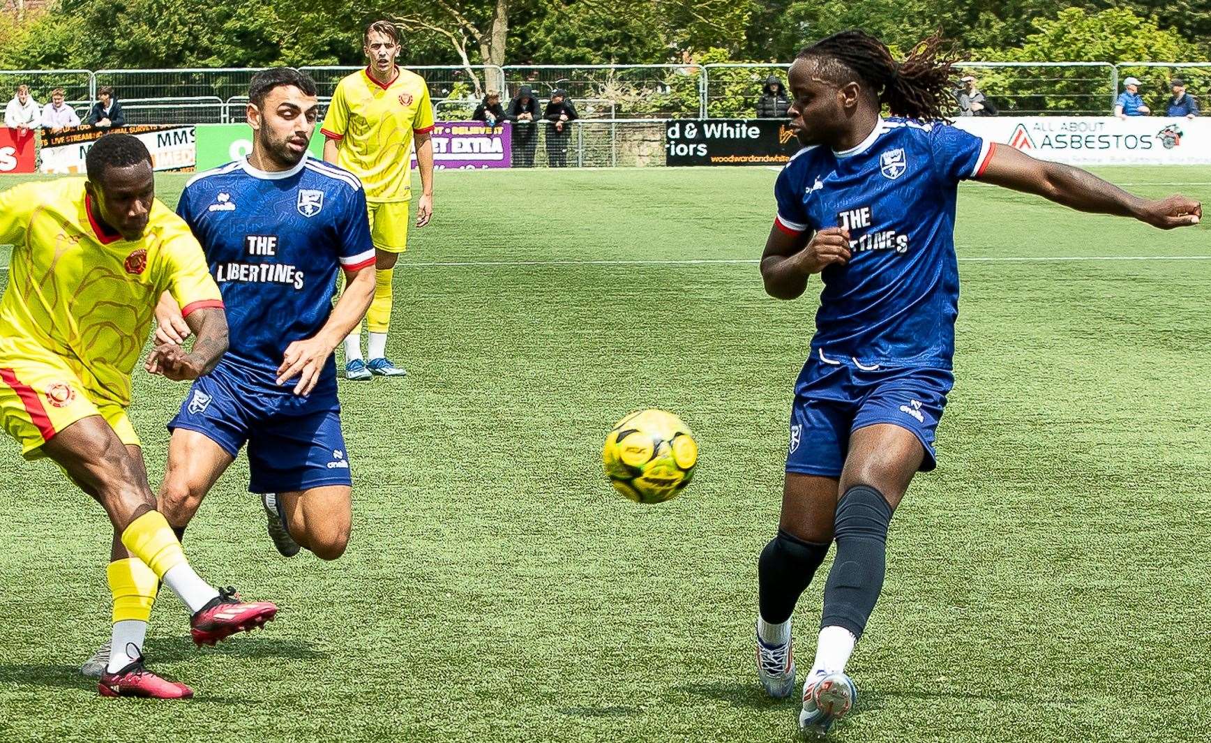 Whitstable attempt to cross ahead of a Margate player with James Bessey-Saldanha in hot pursuit. Picture: Les Biggs