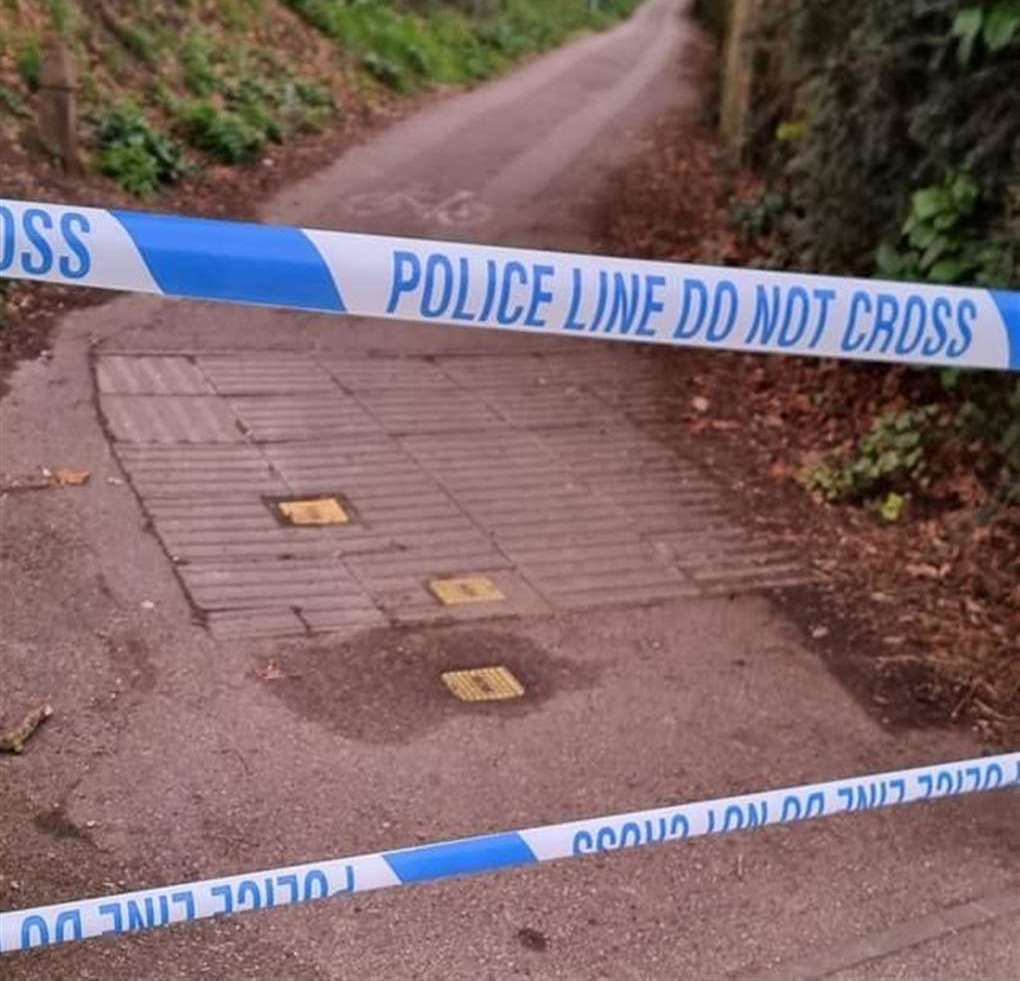 Police later cordoned off the path in Canterbury. Picture: Dan Giff