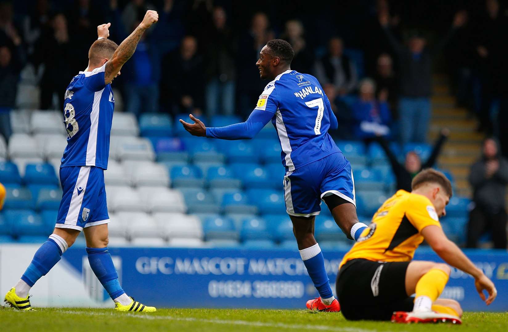 Gillingham's Brandon Hanlan (centre) celebrates the third goal against Southend. Picture: Andy Jones