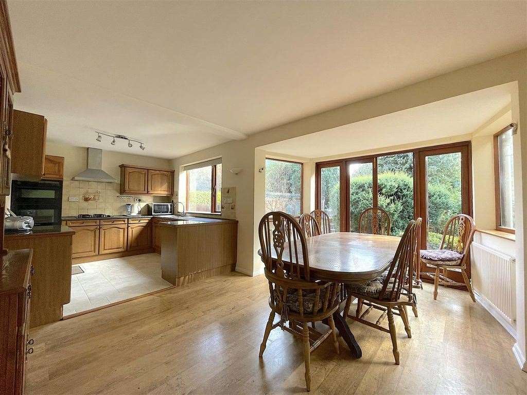 The breakfast table and kitchen in the Faversham home. Photo: Zoopla