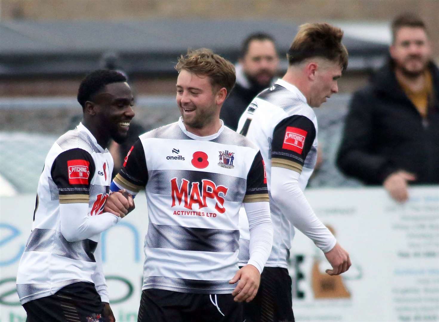 Two-goal Deal man Ife Oni celebrates with team-mate Macauley Murray. Picture: Paul Willmott