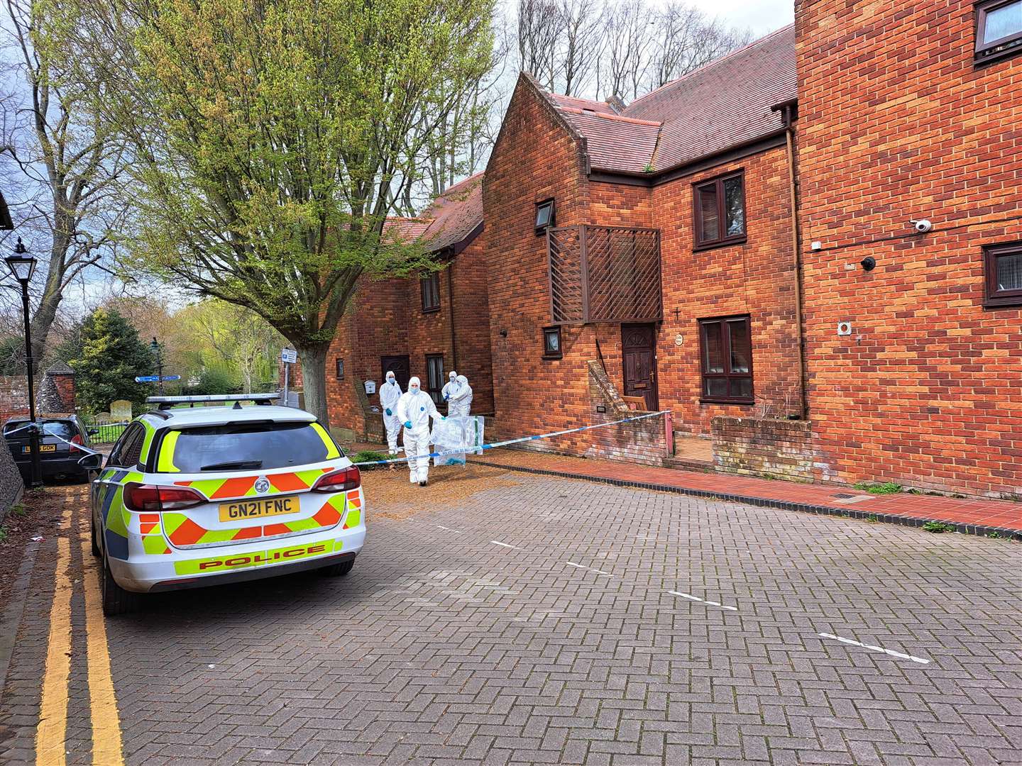 Police and forensics at the scene following the death at Castle Street car park in Canterbury