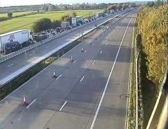 Traffic has been stopped in both directions on the M20 between Junctions 8 and 9 due to a police-led incident. Picture: KCC Highways