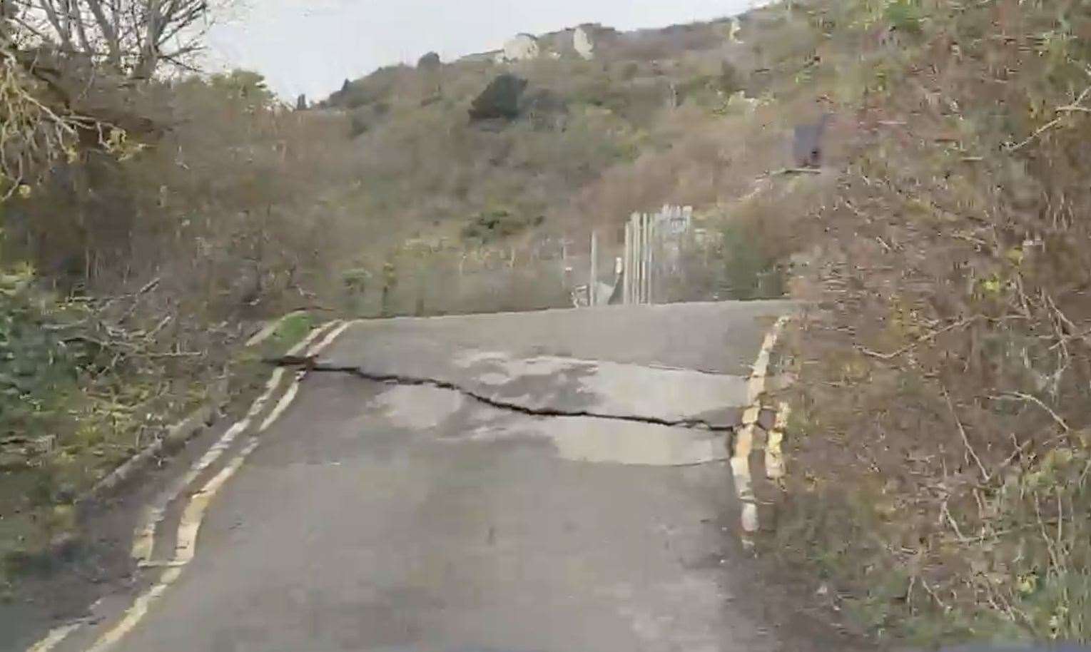 A crack appeared in the road leading to Folkestone Warren earlier this year. Picture: David Larigo