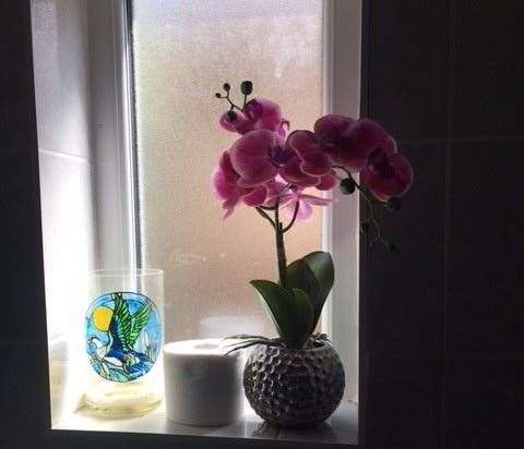 Even the windowsill in the gents has been included in the general decorative style of the rest of the pub