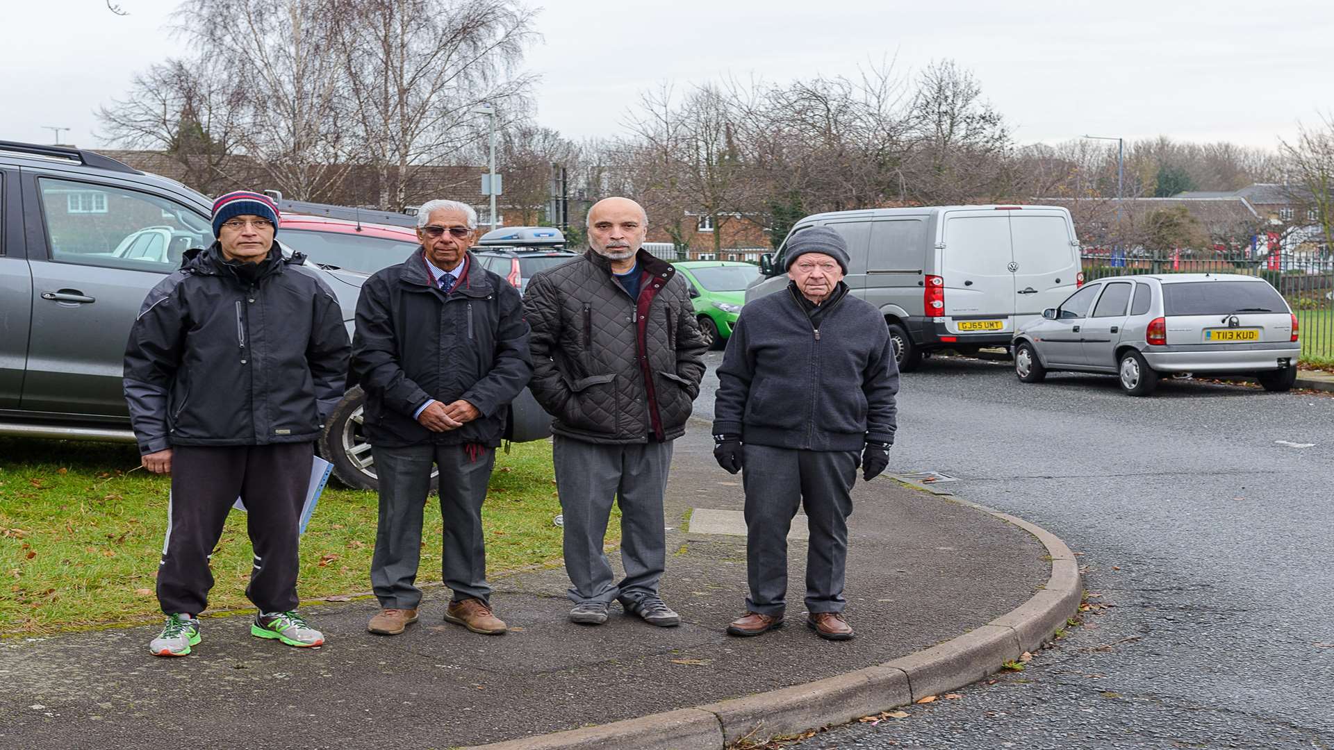 Avninder Singh (resident), Councillor Gurdip Bungar, Iqbal Bains (resident) & James MacDonald (resident) at the corner of Copper Beech Close & Ellerslie, Gravesend.