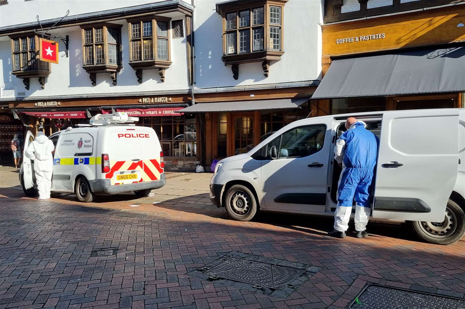 Forensics working in Canterbury High Street on Friday after a murder probe was launched