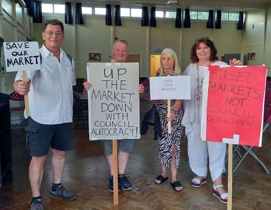 Steve Bamber (second left) and Julie Wassmer (right) with market traders. Photo: Julie Wassmer