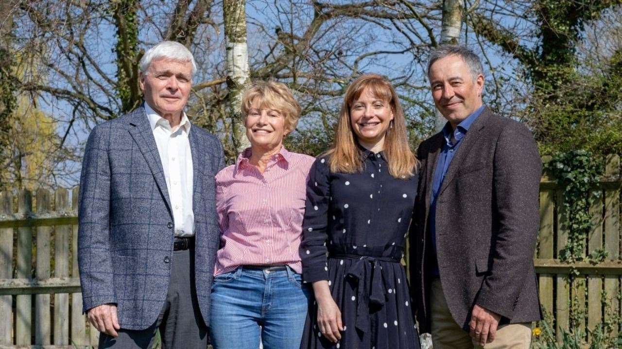 Sally, pictured second to right, and her family