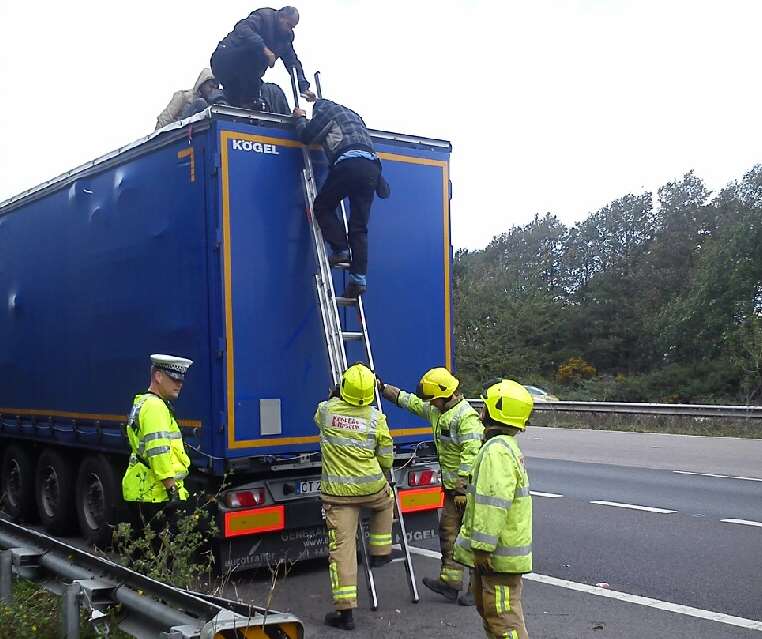 Both men were taken into custody. Picture: Andy Rickwood