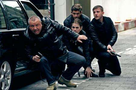 The Sweeney with Ray Winstone as Jack Regan, Ben Drew as George Carter, Hayley Atwell as Nancy and Paul Anderson as Allen. Picture: PA Photo/Entertainment One