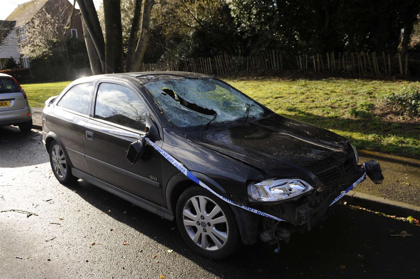 A smashed car was found near the fallen tree in Dover Road, Walmer, during Storm Katie