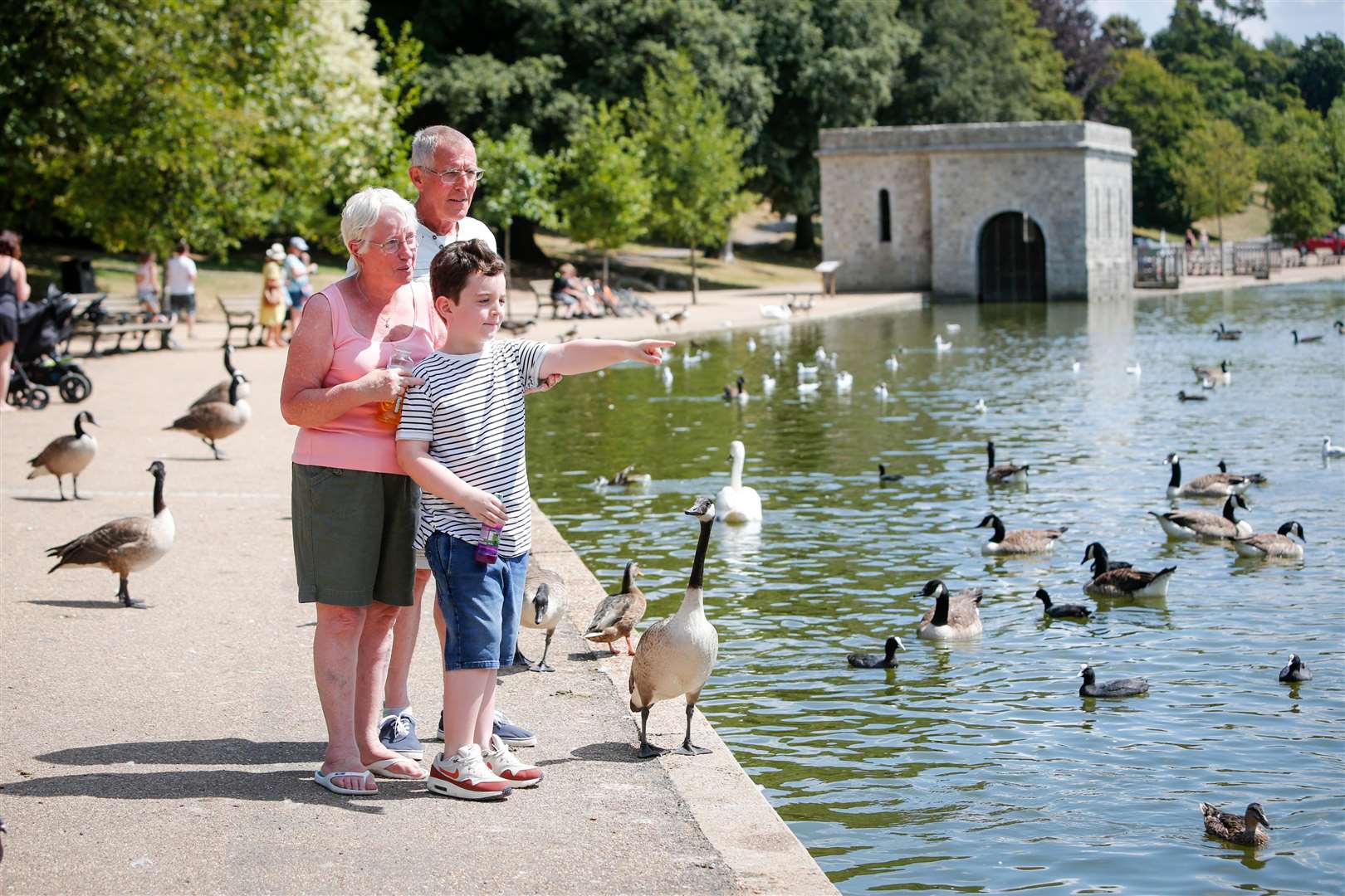 Visitors enjoy the sunshine at Mote Park in Maidstone. Picture: Matthew Walker