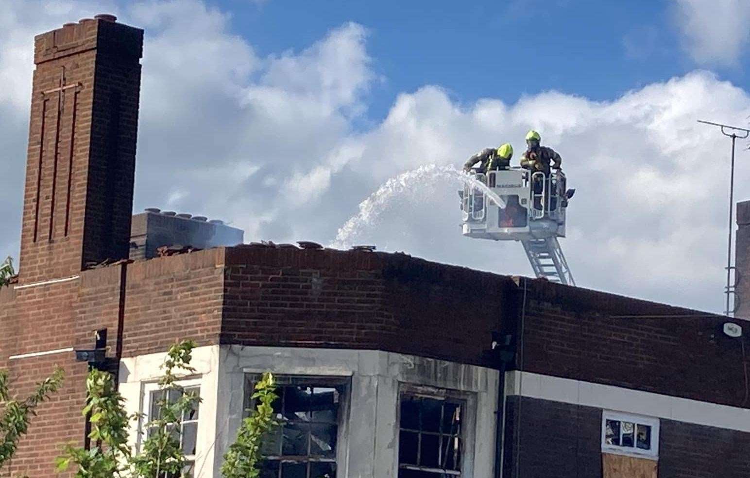 Firefighters put out a fire at the former Nore pub in St George's Avenue, Sheerness. Photo: John Nurden