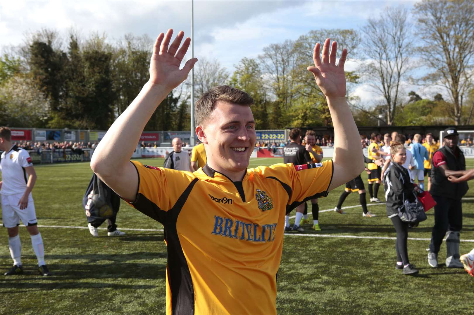 Alex Flisher, his season ended by injury four months earlier, was given a great reception when he came on the pitch to collect the Ryman Premier trophy in 2015. Picture: Martin Apps