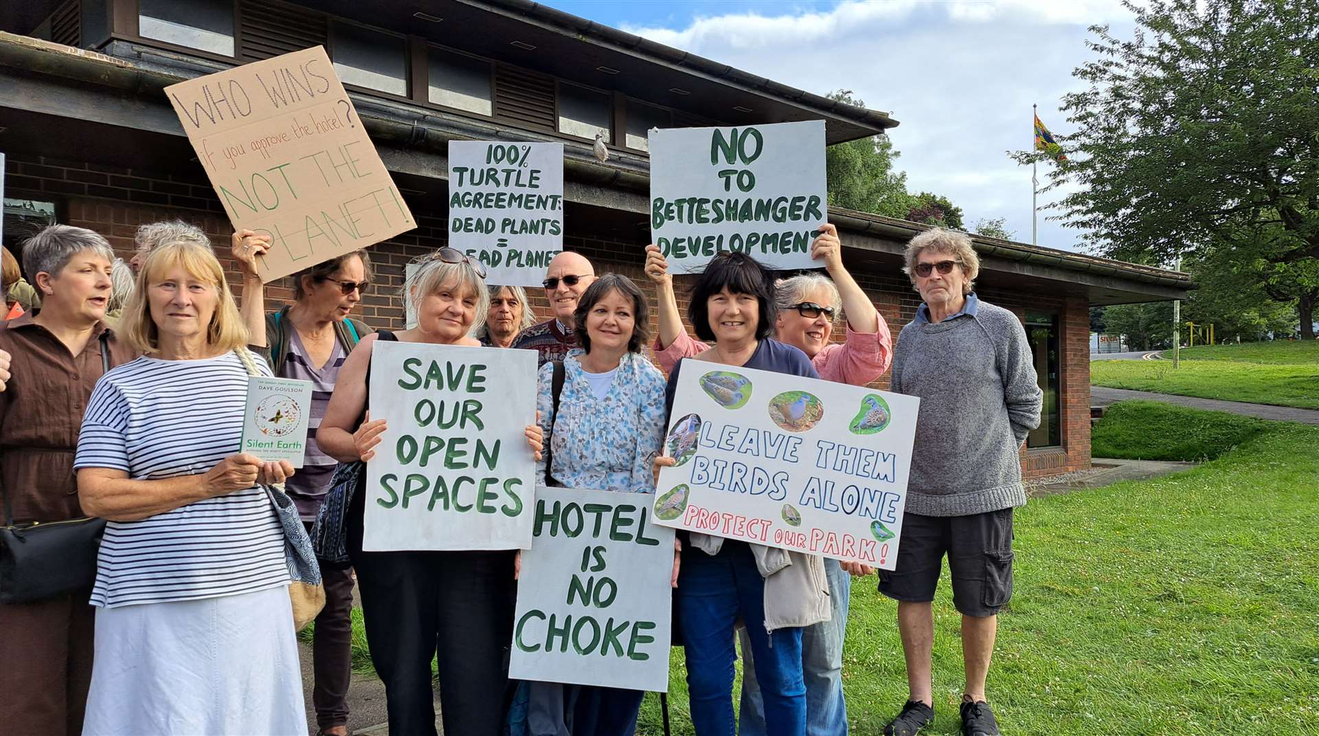 Demonstrators fighting the hotel application just before the council meeting