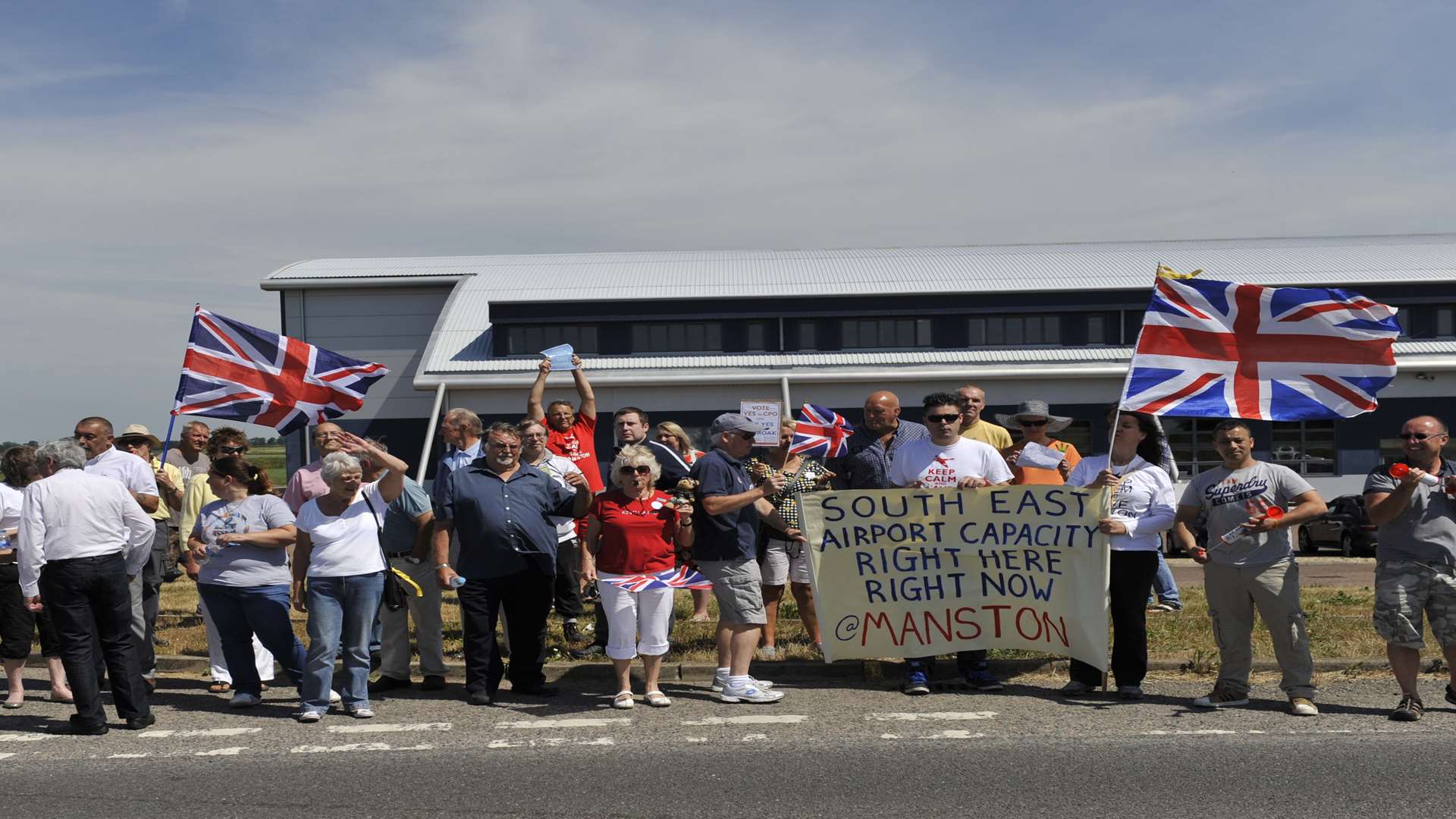 Protestors outside the airfield