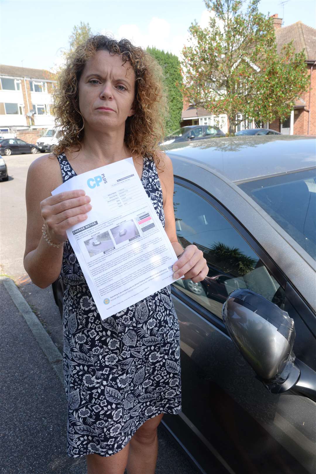 Toni Bates of Rainham and her parking fine. Picture: Chris Davey. (3911952)