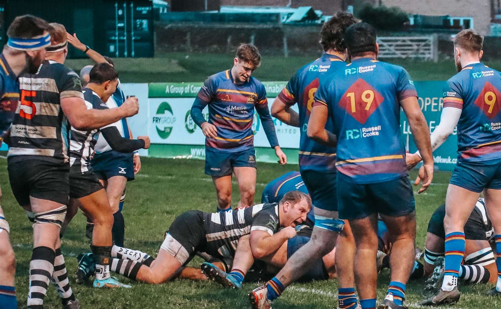 Gravesend's Matt Hewitt, centre, in the thick of the action against Cobham. Picture: @jp-photographerUK