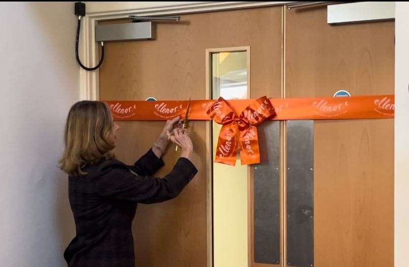 The Lady Annabel Colgrain cuts the ribbon of the new wing