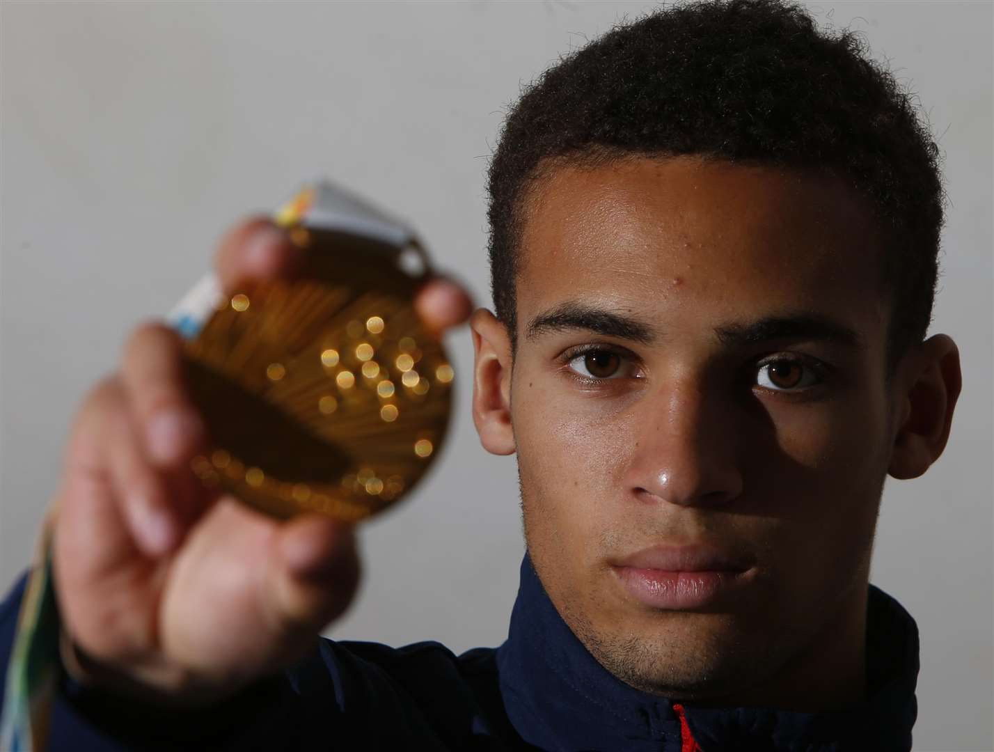 Karol Itauma with his gold medal from the Youth Olympics