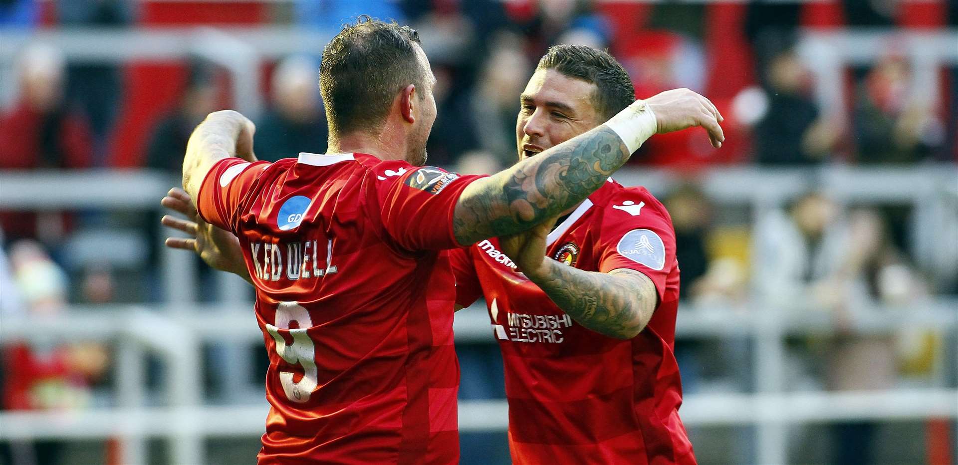 Danny Kedwell celebrates with Cody McDonald Picture: Sean Aidan