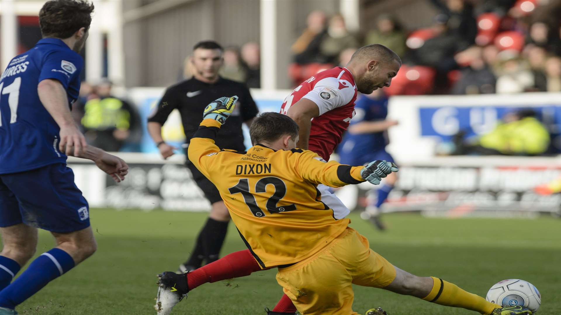 Luke Coulson is denied by the Barrow keeper. Picture: Andy Payton