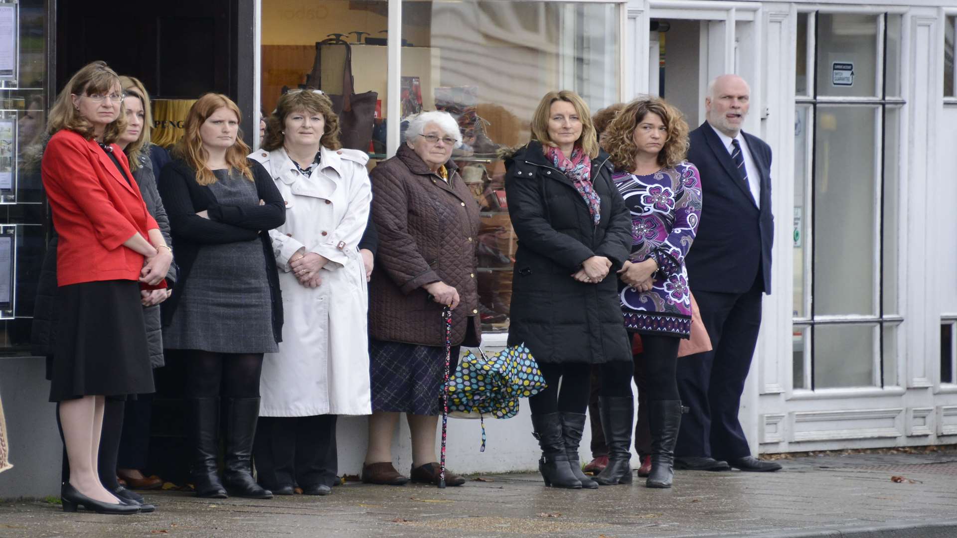 Shop staff and customers stopped to pay their respects.