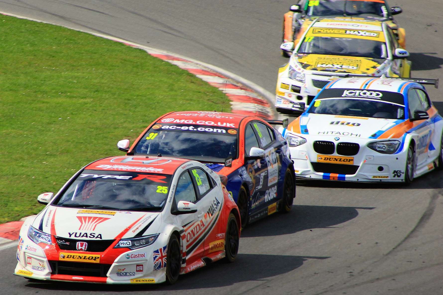 Neal leads Goff and the pack down Paddock Hill bend. Picture: Joe Wright