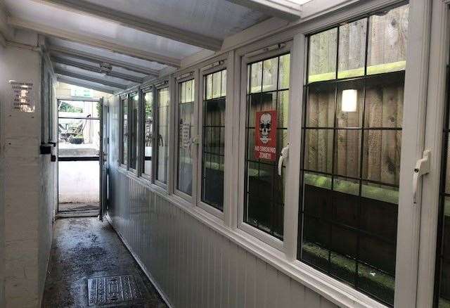 This is the lean-to/tunnel entrance linking the garden at the Monks Head in New Hythe Lane to the pub. I don’t think I’ve seen 10 windows in a row before.