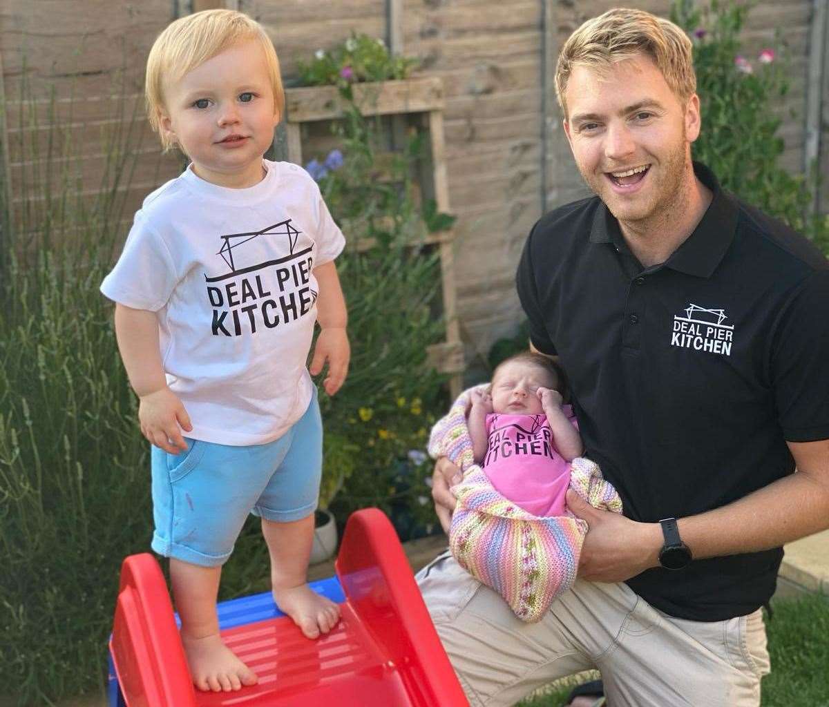 Tim Biggs with Teddy and Florence, who he has named the new coffee shop after