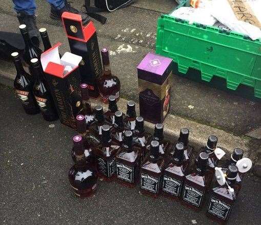 Police seized 25 bottles of alcohol found in a suspected stolen car on Saturday. Picture: Kent Police