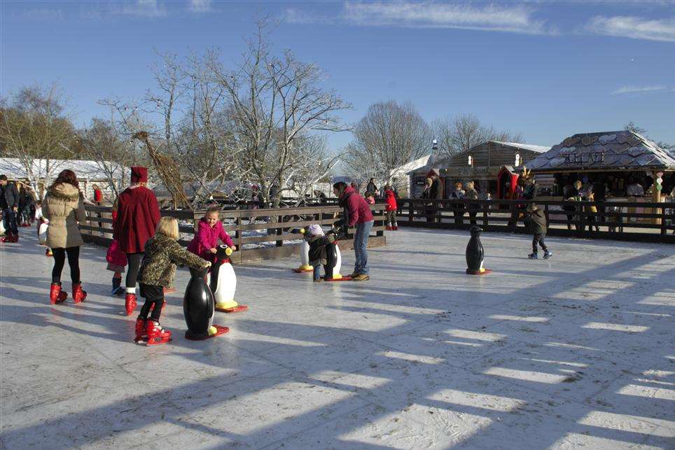 Children and parents enjoy the Elf square at Lapland UK.