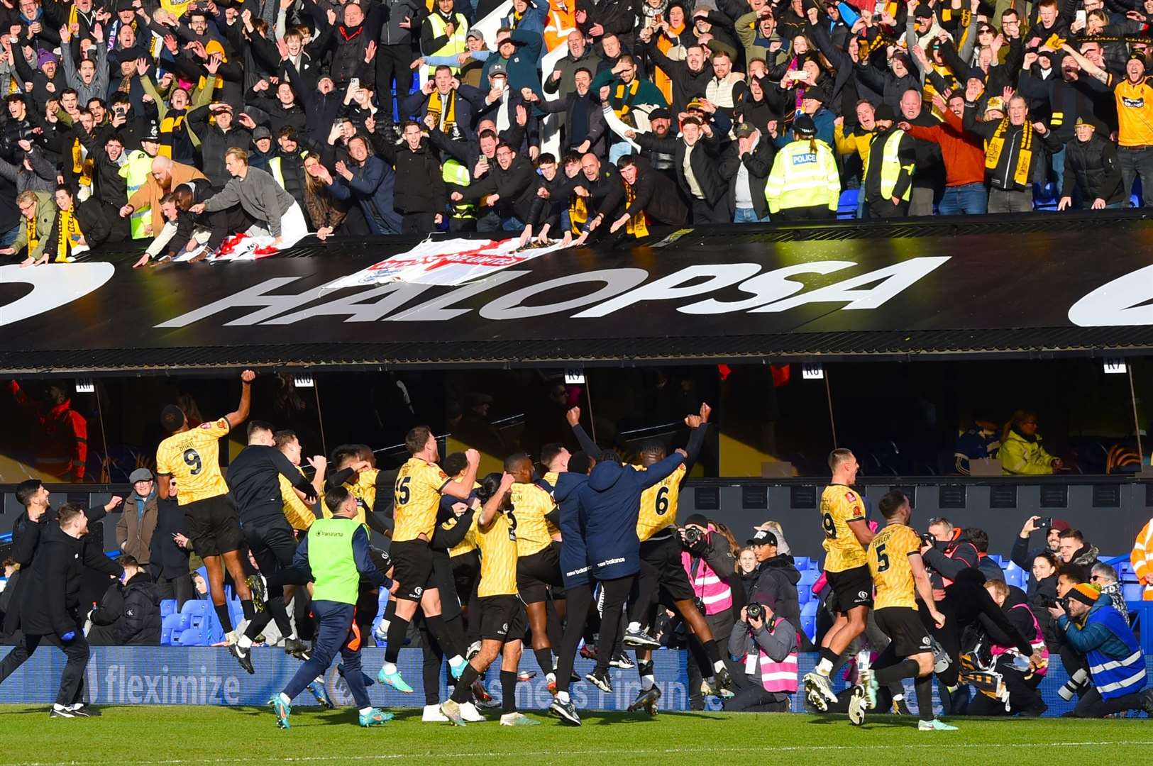 Maidstone celebrate with fans after beating Ipswich in round four. Picture: Steve Terrell