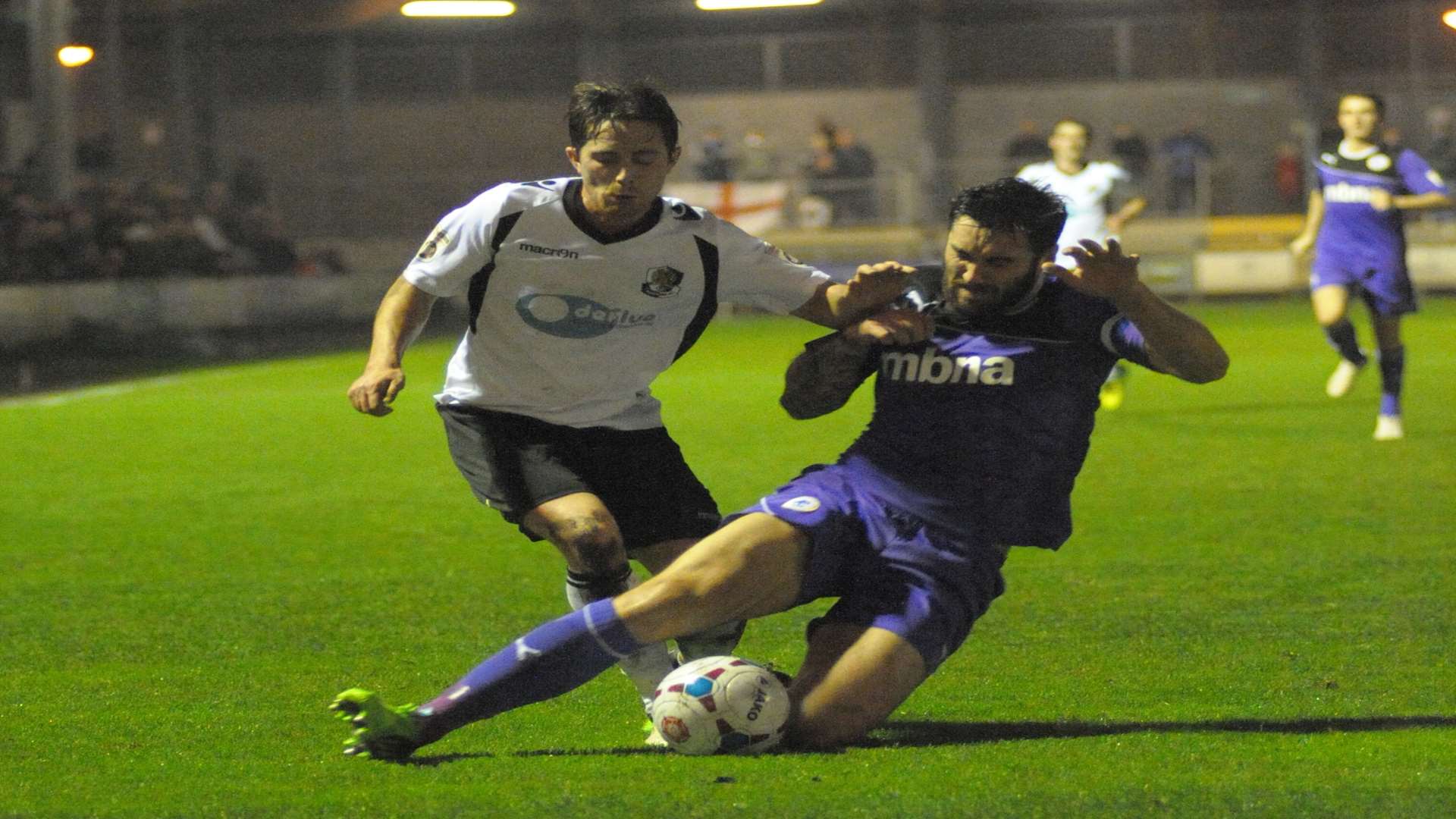 Lee Noble tackled by Chester captain Matthew Brown Picture: Steve Crispe