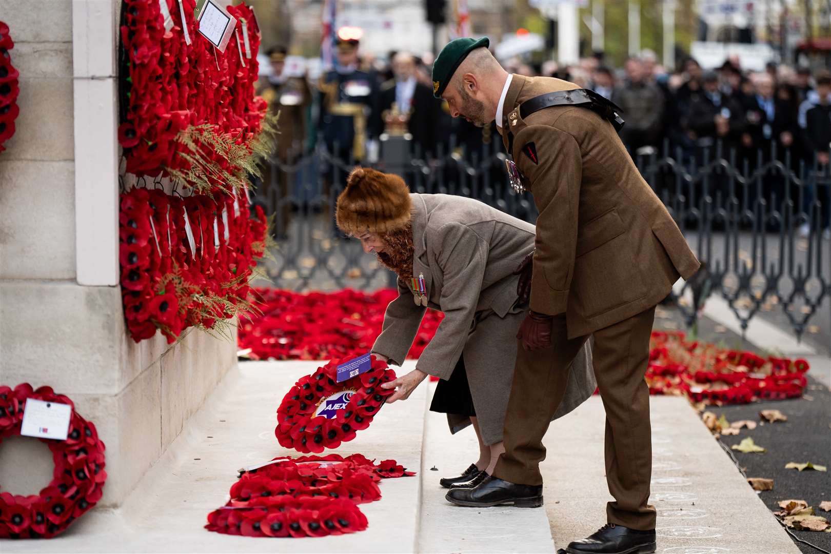 Henny Franks, 101, (left) Kindertransport survivor lays a wreath during the annual parade by AJEX, the Jewish Military Association (Aaron Chown/PA)