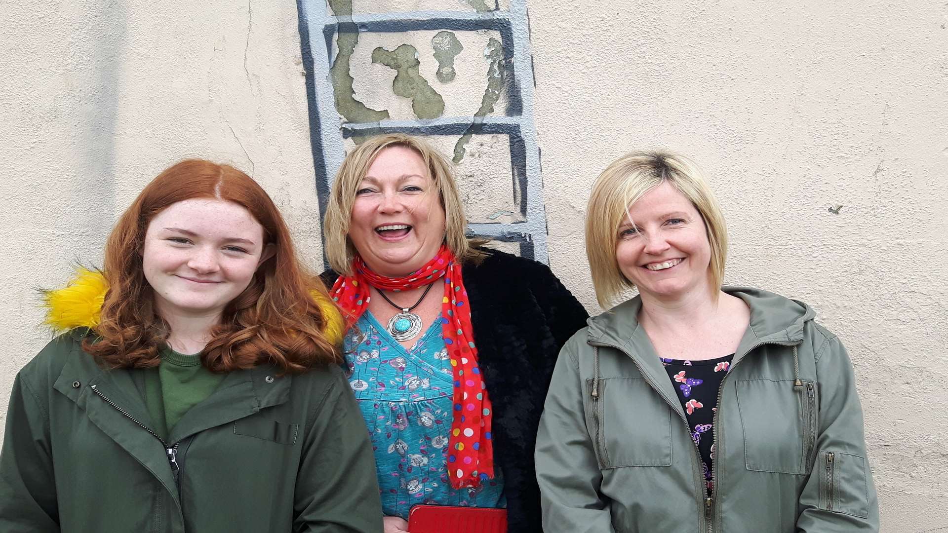 Banksy mural in Dover.From left at the ladder section. Erin O'Hare, Dawn Maddison, Laura Graham.