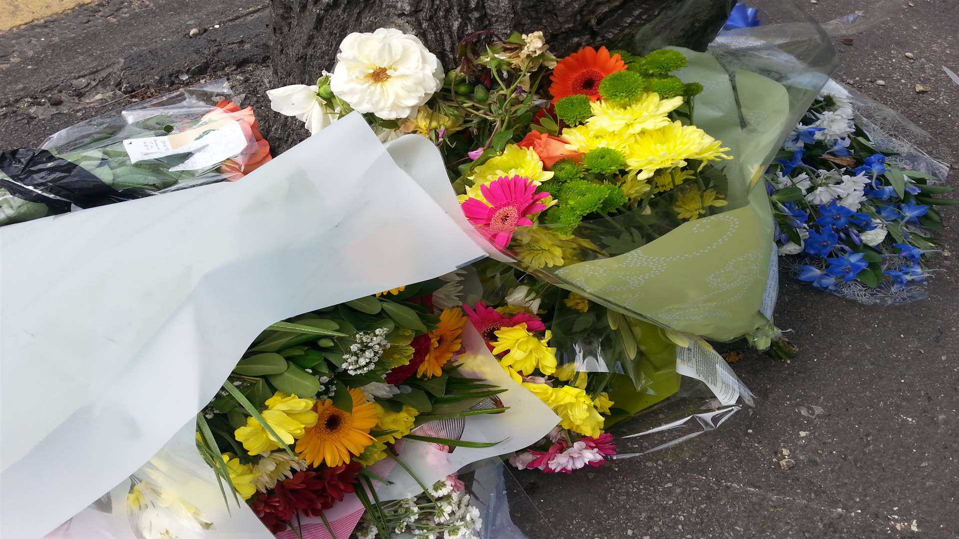 Floral tributes have been left at the scene