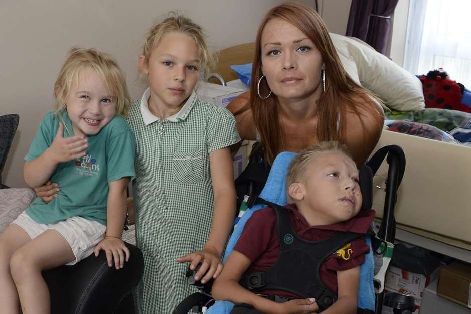 The Kay family - Sam with Jake, Abigail and Isla