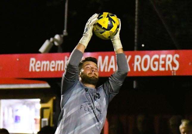 Herne Bay goalkeeper Harry Brooks confidently claims on his way to another clean sheet. Picture: Marc Richards