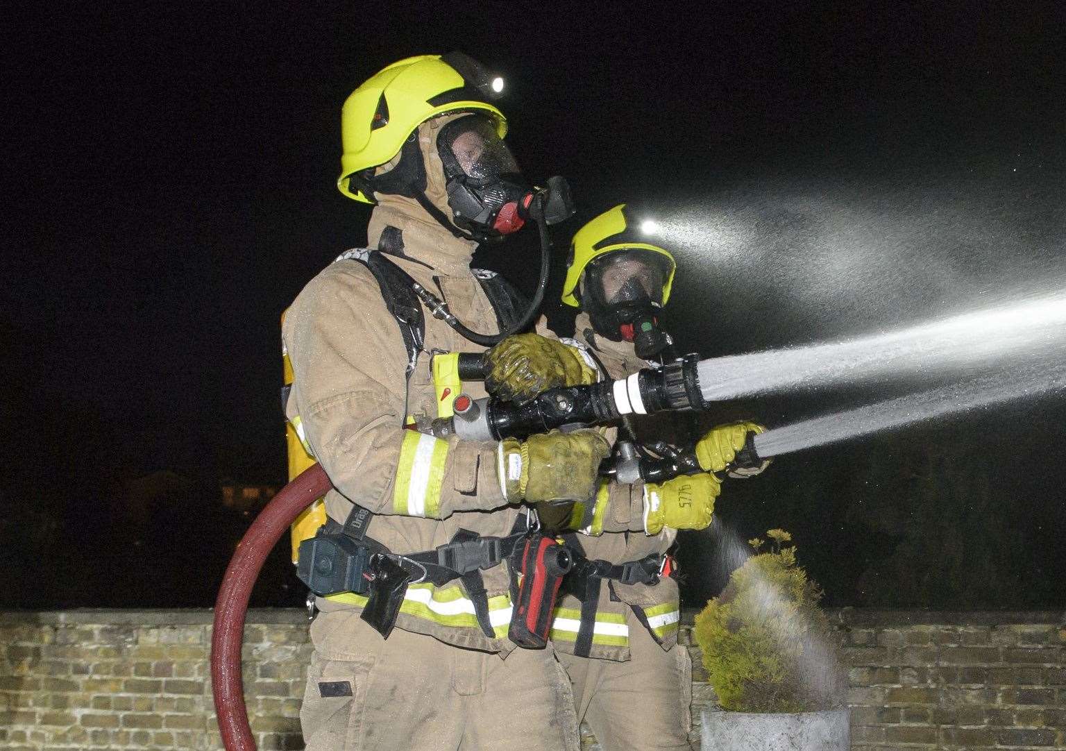 Crews wearing breathing apparatus tackled the flames. Stock picture