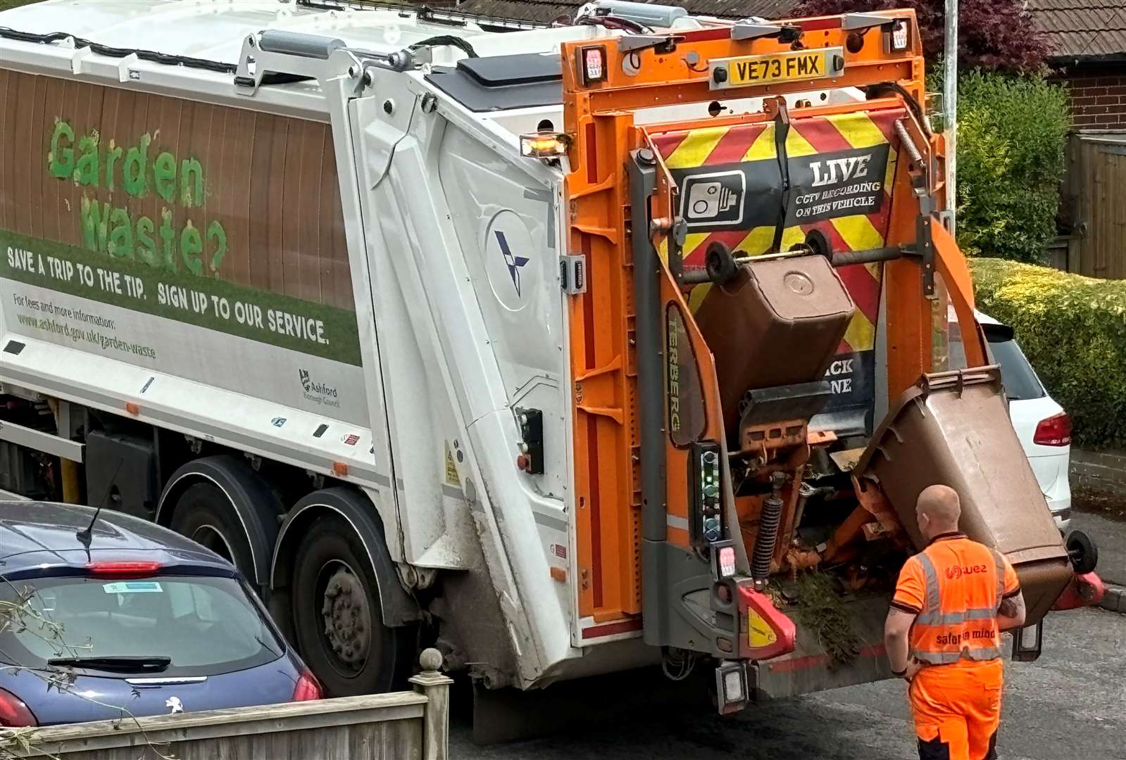 Suez workers collecting garden waste in Ashford