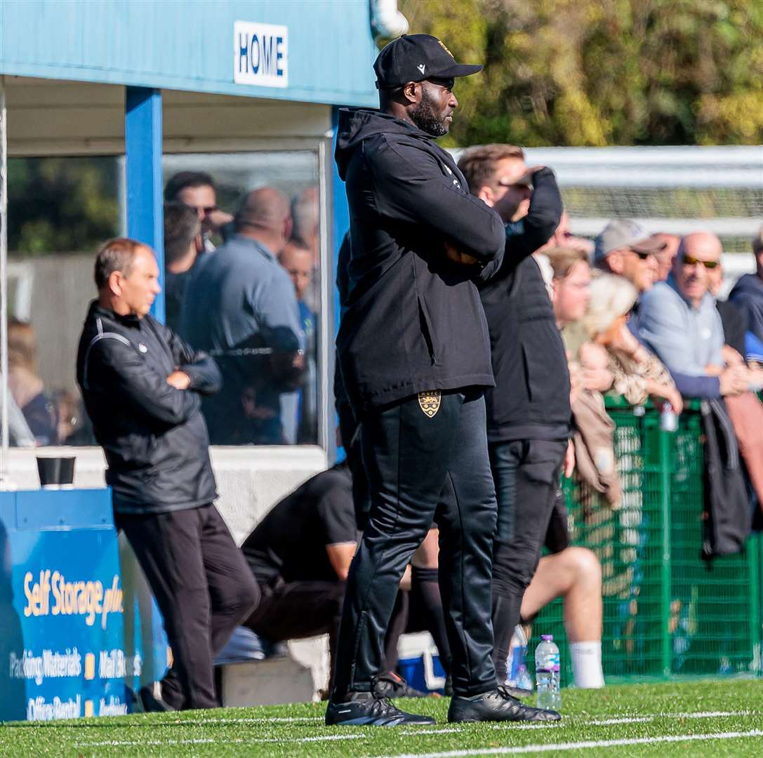 Maidstone boss George Elokobi watches on at Winch's Field. Picture: Helen Cooper