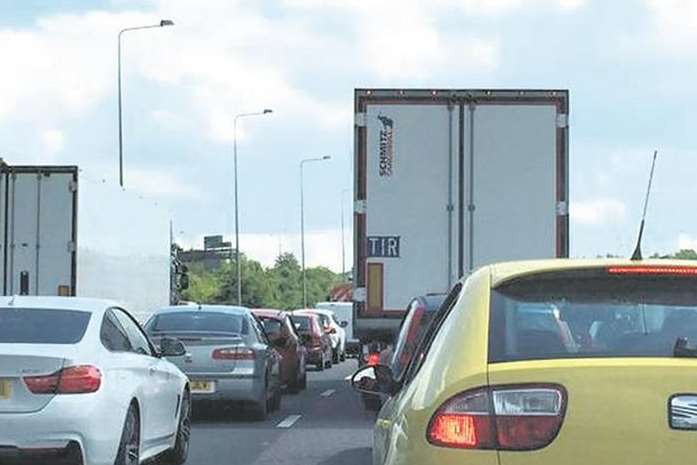 Traffic is queuing on the A20 slip road due to an accident on the M20