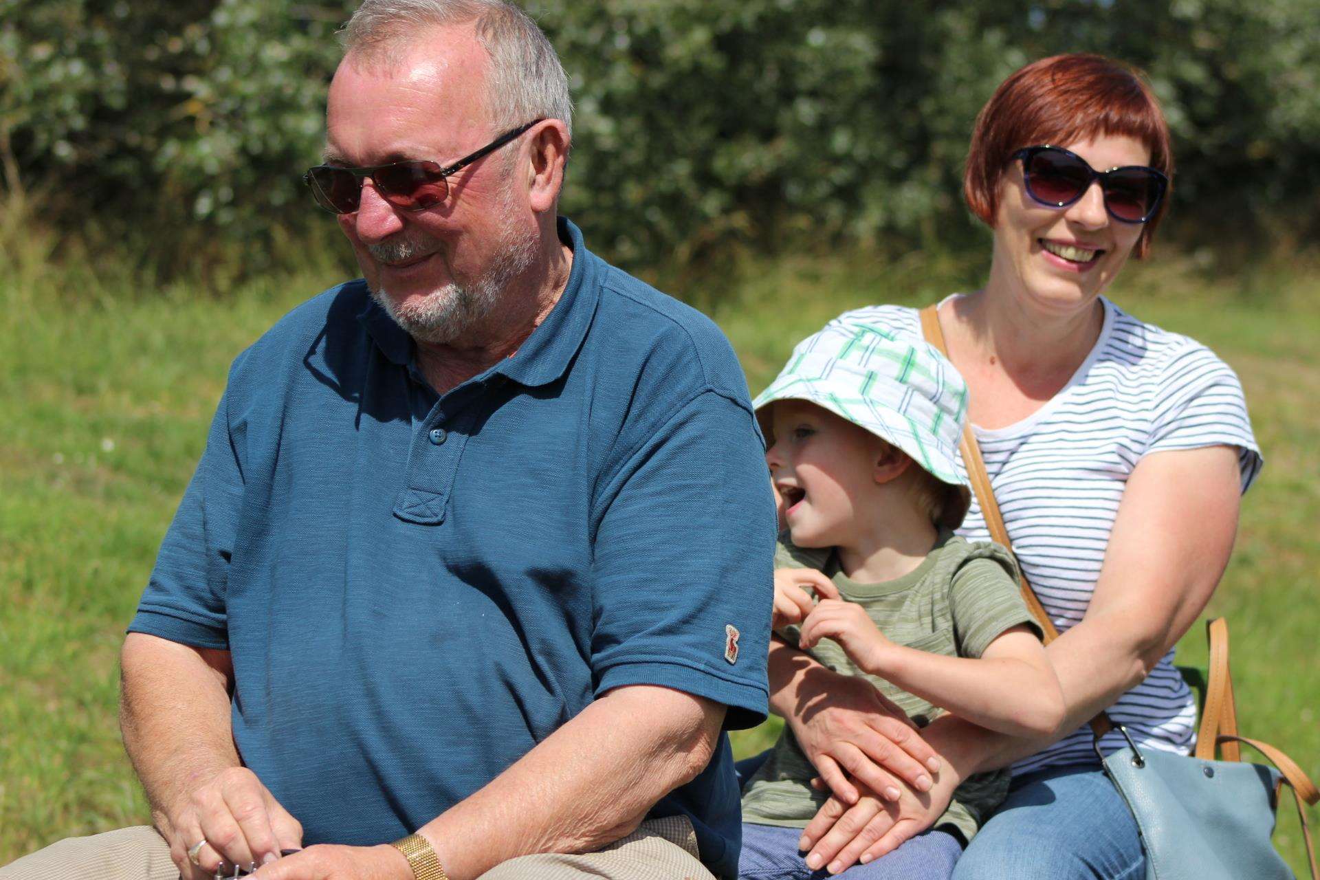 Nigel Ingram driving Minster florist Kalina Wierszycka and her son Antoni, 3, round the Sheppey Miniature Engineering and Model Society at Barton's Point, Sheerness (2713885)