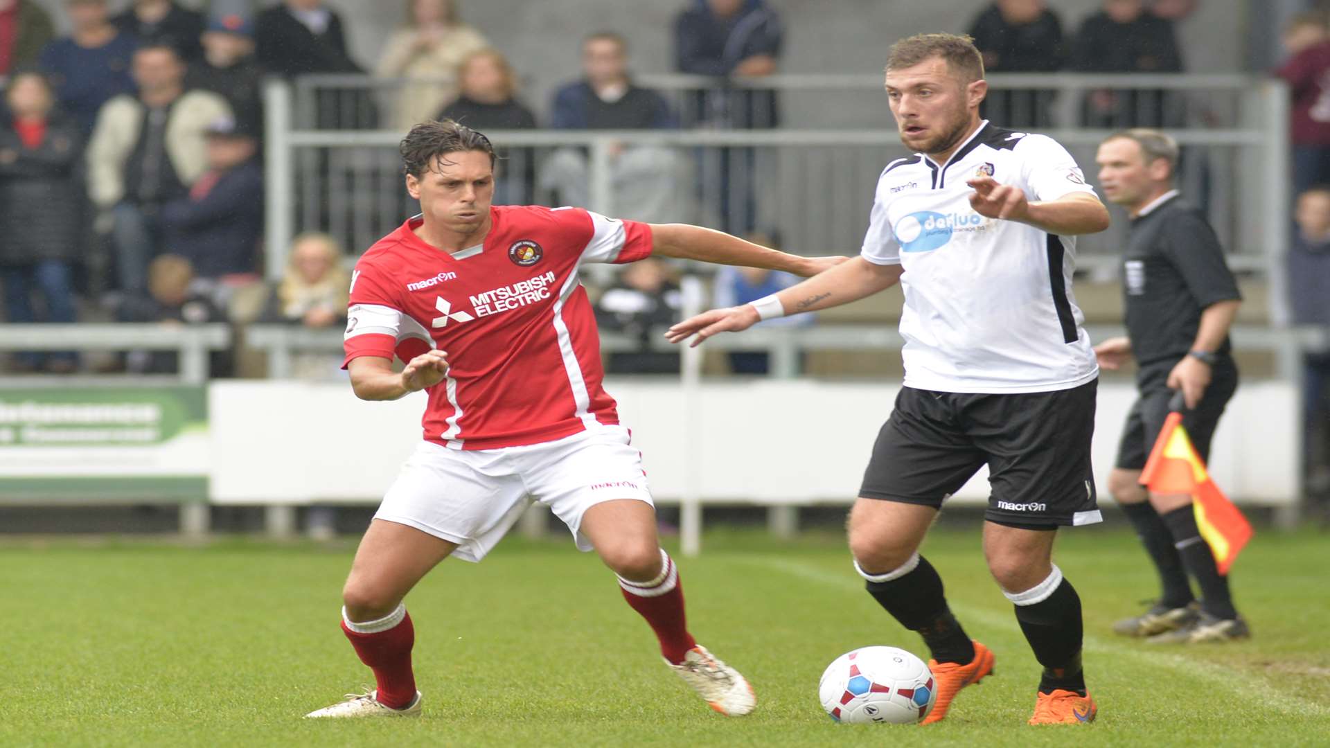 Ebbsfleet full-back Joe Howe challenges Dartford's Ryan Hayes on the touchline Picture: Ruth Cuerden