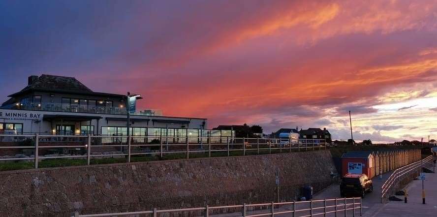 Blue, pink and orange clouds light the the Minnis Bay bar and resturant and the beach huts along the promme on the October 5. Pic: Ian Noble.